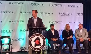 Kentucky Gov. Andy Beshear speaks at Sandy's Racing and Gaming grand opening on Thursday.