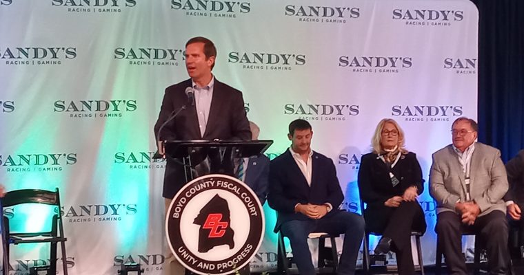 Kentucky Gov. Andy Beshear speaks at Sandy's Racing and Gaming grand opening on Thursday.