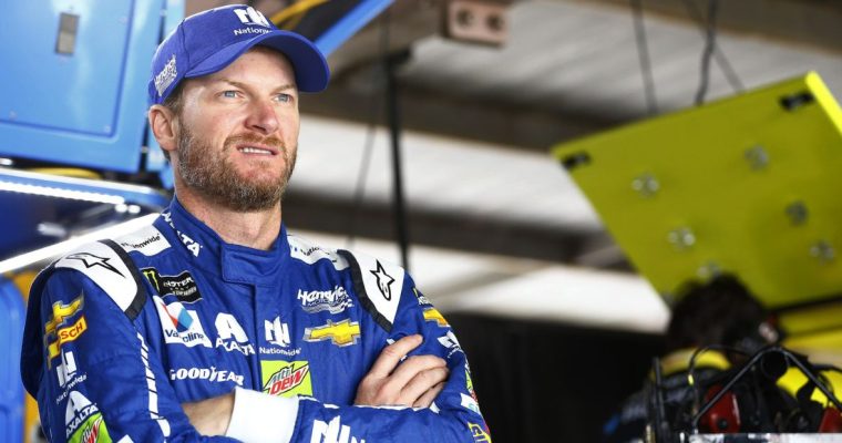 Dale Earnhardt Jr. sitting in his garage before a race