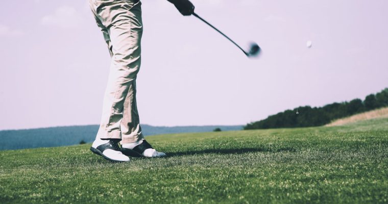 Golf player swings