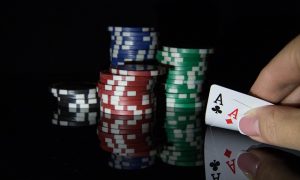 Poker aces and chips