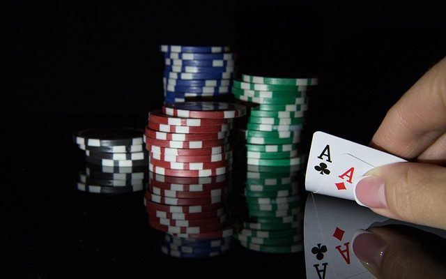 Poker aces and chips
