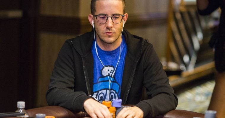 Greg Merson poker player at table