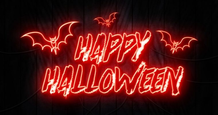 Electric Red Neon Says Happy Halloween with Bats
