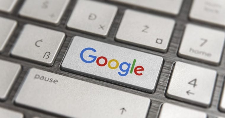 Computer Keyboard Has Google Logo On Enter Button