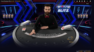 Live Dealer Sits Behind Blackjack Table in SpinBlitz' 7 Seat Blackjack Tournament