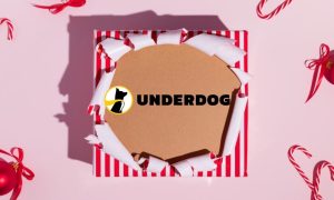 Unwrapped Red and White Christmas Gift Reveals Underdog Logo