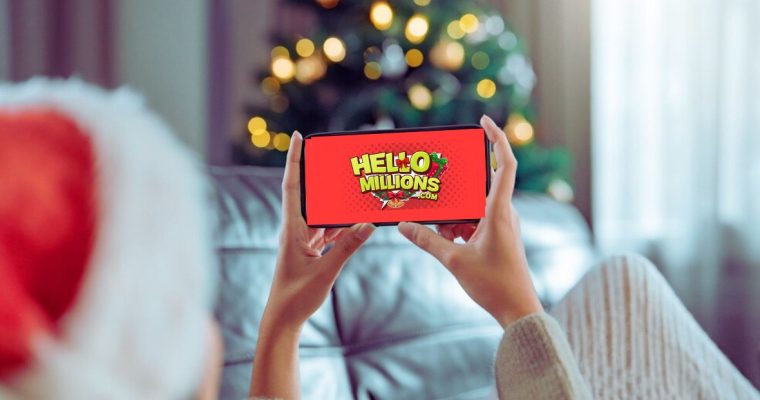 Woman Plays HelloMillions on Cell Phone with Christmas Tree Background