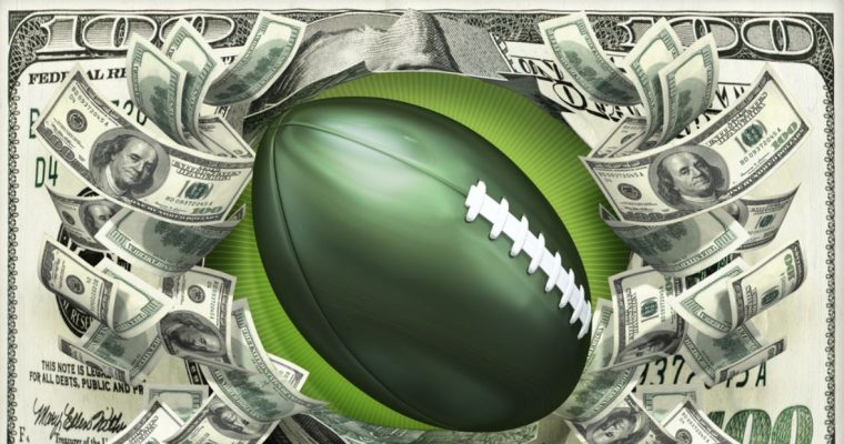 Green American Football Surrounded By Cash Bills with $100 Bill Background