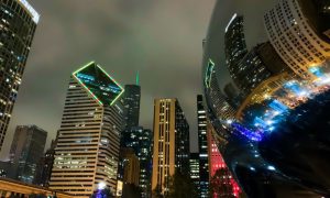 Gray Skies and Chicago Skyline Reflected in Iconic Bean
