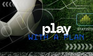 "Play With A Plan" Text Over Image of Soccer Ball on Green Grass