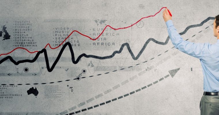 Red and Black Data Lines Drawn on Grey Background by Man in Suit