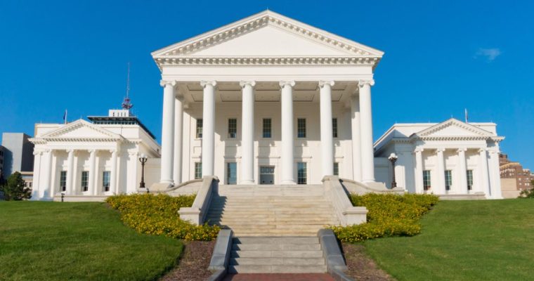 VA State Capitol White Building Exterior with Green Grass and Blue Skies
