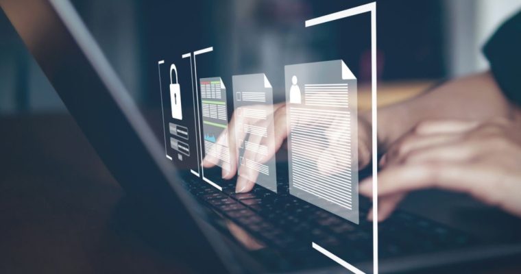 Person Typing on Laptop With Digital Overlay Concept of Identity