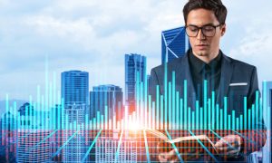 Digital Bar Graph Overlay on Image of Business Man In Front of Cityscape