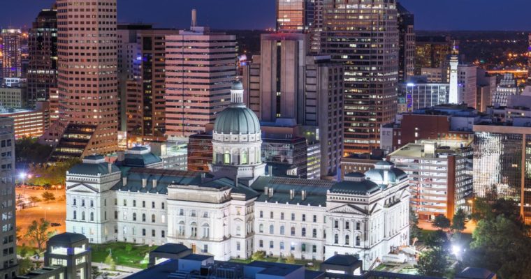 Night Ariel View of Indiana State Capitol And City Background