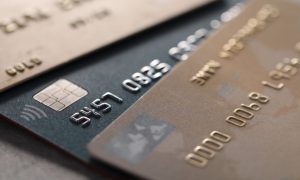 Close Up View of Three Credit Cards Fanned Out on Table
