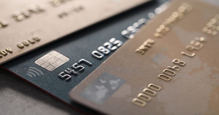 Close Up View of Three Credit Cards Fanned Out on Table