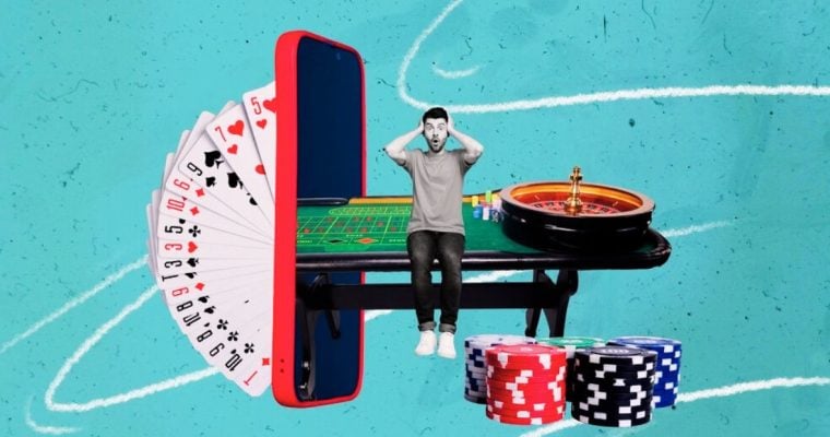 Colorful Poker Chips, Roulette Wheel, Playing Cards and Cell Phone Surround Man in Black and White