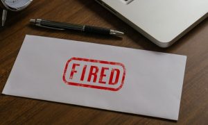 Iowa DCI agent claims he was fired for questioning a gambling probe.