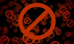 Large Red Blocked Symbol with Smaller Symbols in the Background