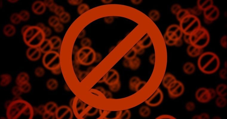 Large Red Blocked Symbol with Smaller Symbols in the Background