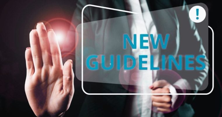 Woman Holds Out Palm in Stop Gesture with Digital Overlay Text of New Guidelines