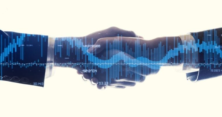 Blue Bar Graph Digital Overlay on Two Hands Shaking on Ivory Background