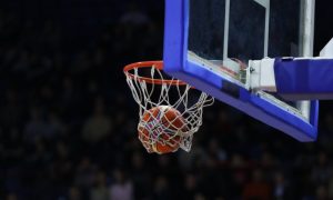 Blue Lined Backboard with Basketball Netting Hoop Inside Game Stadium