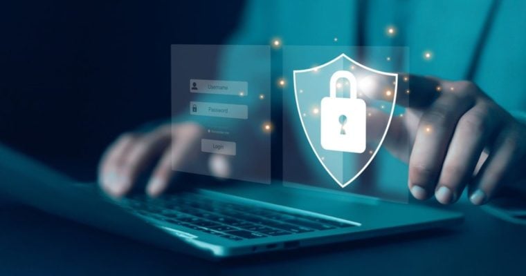 Man Sitting in Front of Laptop Self-Excluded from Gambling Website Sees Digital Locked Icon