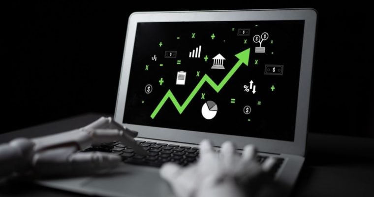 Black and White Image of Hands Using Laptop Displaying Bright Green Upward Trending Arrow and Economic Icons