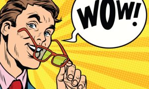Comic Cartoon Of Man In Suit With Speech Bubble Saying Wow!