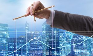 Blue Cityscape Background With Man in Suit Holding Puppet Sticks Over Line Graph