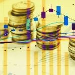 Coins Stacked On Papers with Colorful Candlestick Graph Overlay and Gold Overtone on Entire Image