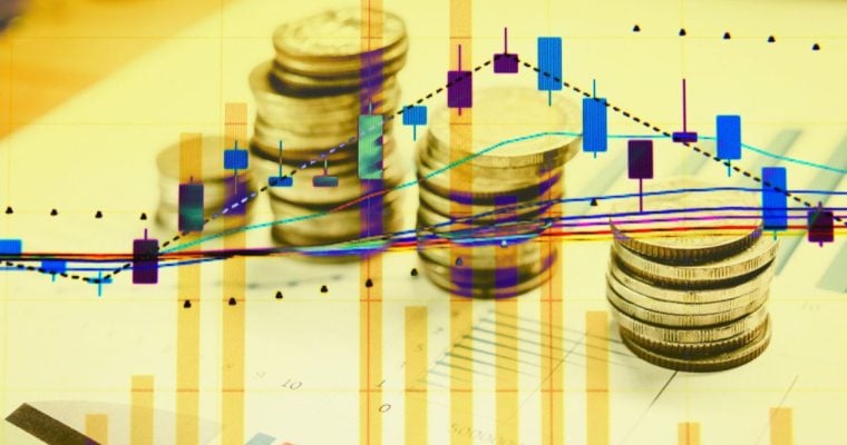 Coins Stacked On Papers with Colorful Candlestick Graph Overlay and Gold Overtone on Entire Image
