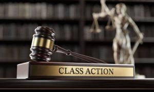 Wooden Judge's Gavel With Stand Reading Class Action inside Library Background