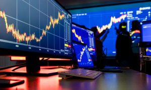 Financial Analysis Graph Chart, Cryptocurrency Report on Multiple Computer Screens