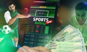 Man Uses Mobile Phone for Live Online Sports Betting on Soccer with Cash