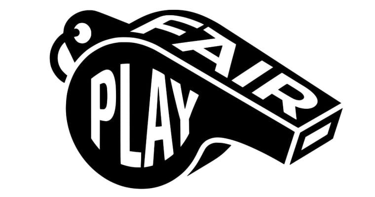 Black Sports Whistle Says Fair Play in White Font on Isolated Background