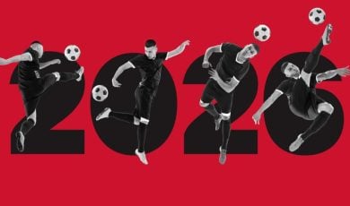 Soccer Players in Action Pictured Over Large 2026 in Black Font Over Red Background