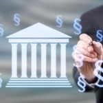 Man in Suit Points to Digital Image of Money Floating Around Washington Capitol Building