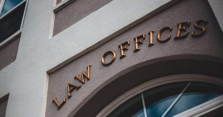 Words Law Offices Hang on Building Facade