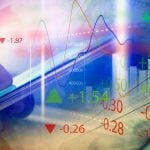 Man Holds Cell Phone in Hand with Digital Overlay of Wave Graphs, Red and Green Market Valuations