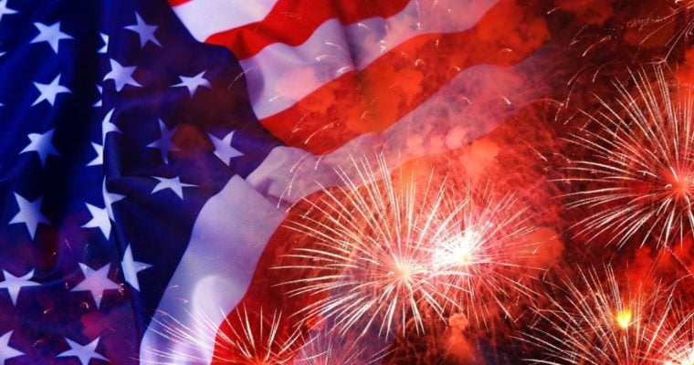 Bursting Fireworks Overlay Image of American Flag in Fourth of July Concept