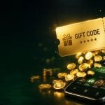 Gold casino bonus code voucher and coins above a phone lobby representing no deposit casino bonus codes for real money