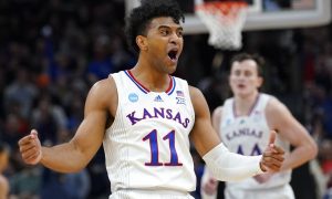 Kansas sports betting passes the House, but a law will come too late for state residents to bet on Remy Martin and the Jayhawks in the NCAA Tournament. (AP Photo/Charles Rex Arbogast)