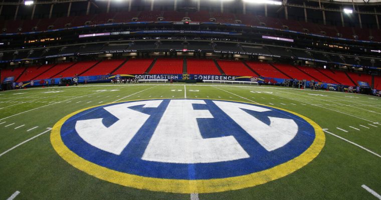 SEC logo on the college football conference championship field