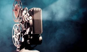 old film projector with dramatic lighting