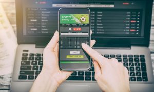 betting bet sport phone gamble laptop concept