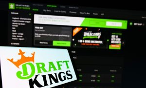 Logo of DraftKings Sportsbook and a picture of their online website